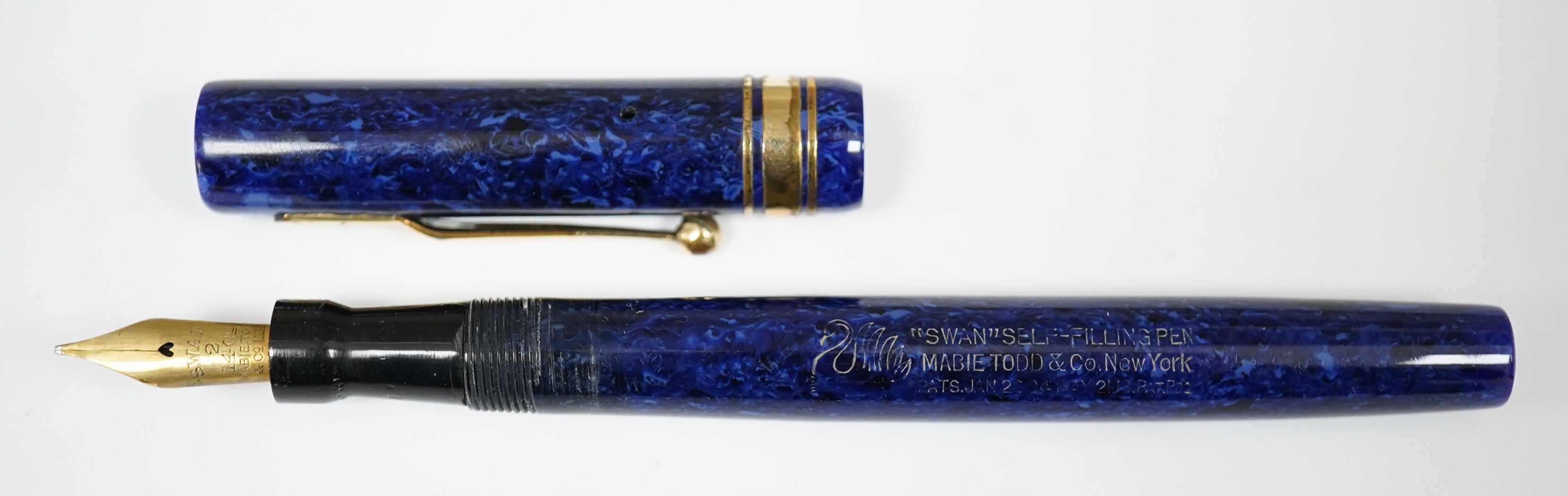 A Swan Mabie Todd & Co. lapis blue lever filler with gold filled trim